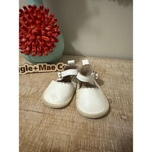White leather monkey feet baby shoes